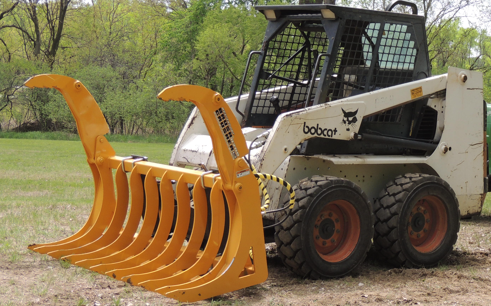  The BC-8000 Brush Crusher™ is equipped with a 
universal adapter (highlighted in yellow) which 
works with both the universal skid-steer 
coupler and the Westendorf Snap-Attach™ system 
on 20, 40, and 70 series loaders. This makes 
switching from your skid-steer to your front-
end loader a quick and easy process.